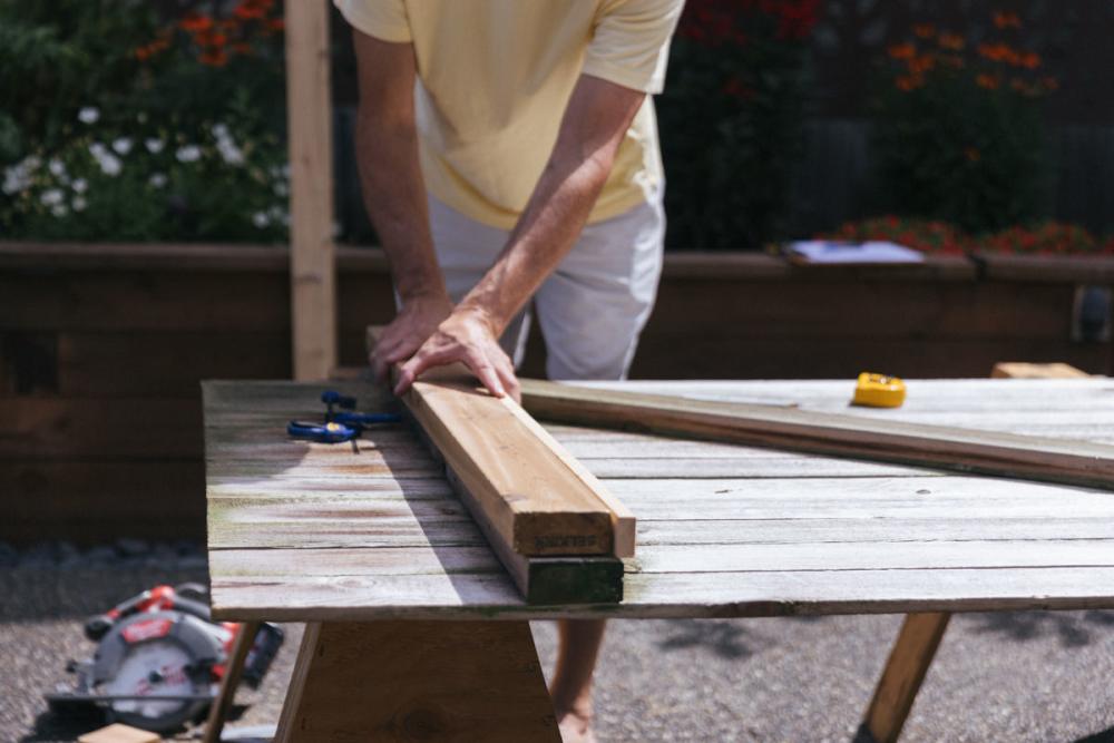 Laying a new board for the Z-frame over the old board.