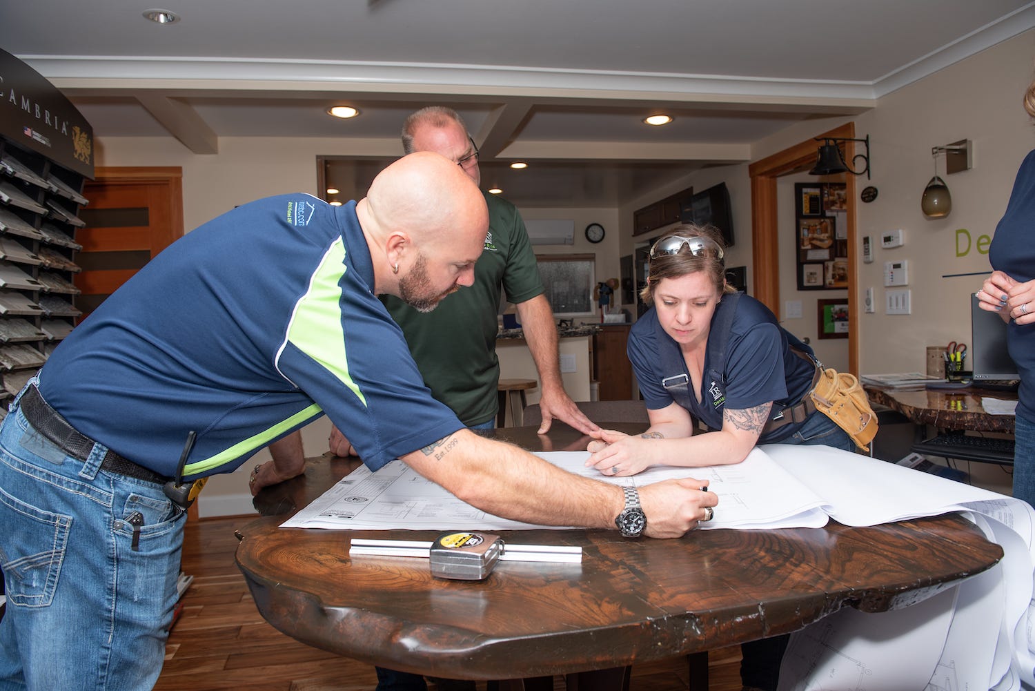 Safety First: A Female Carpenter Changing Fall-Arrest Harness Standards