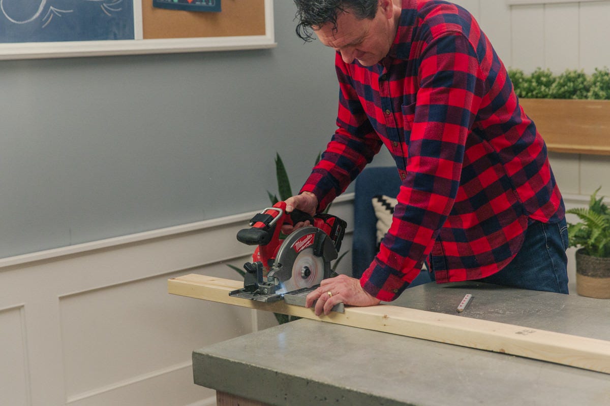 cut two by four Cutting board with Milwaukee circular saw.