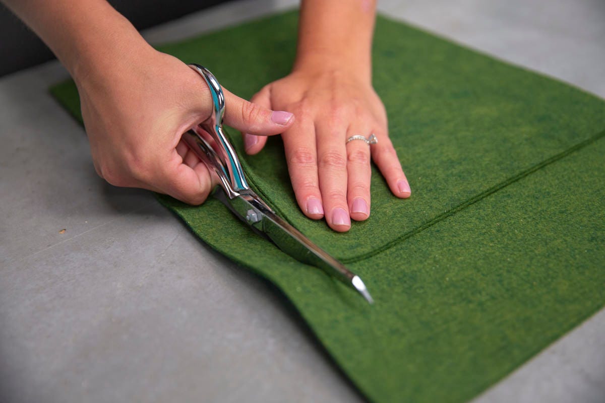 cutting pieces of felt cutting pieces of felt
