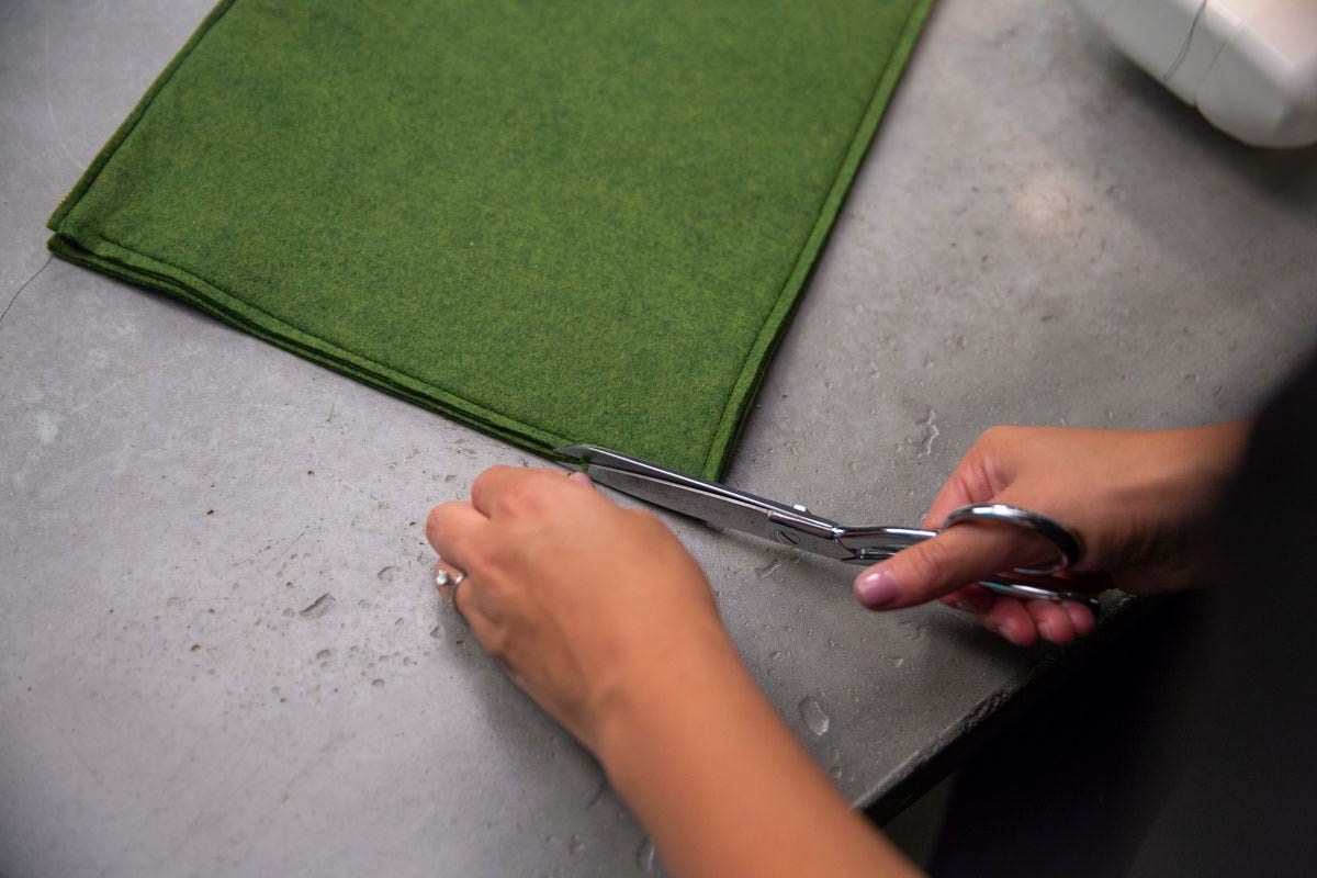 trimming edges of felt case trimming edges of felt case