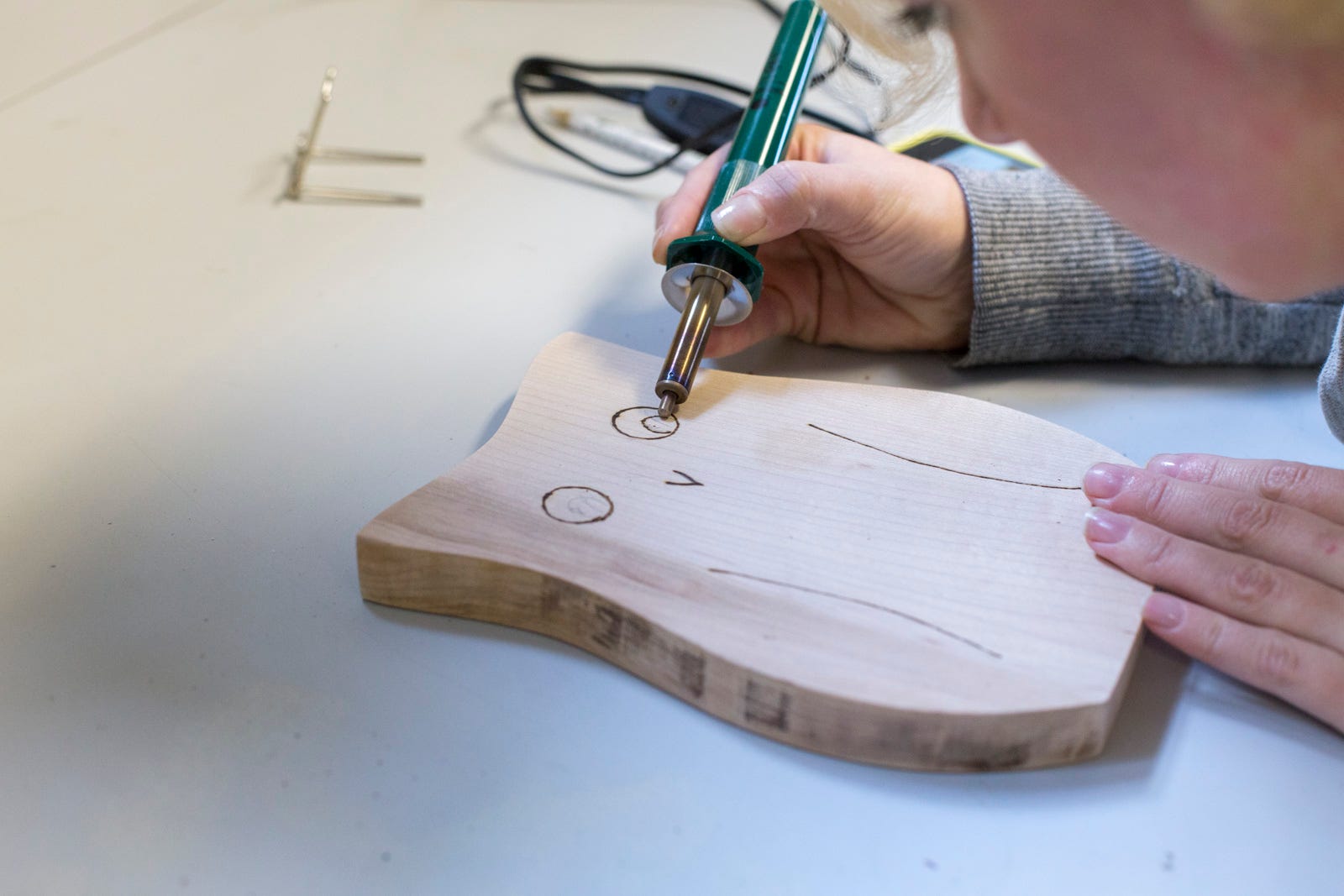 drawing eyes on owl with wood burner drawing eyes on owl with wood burner