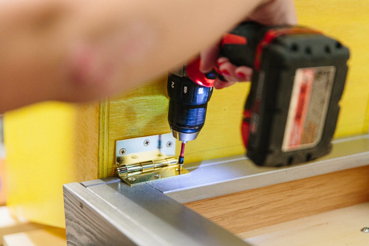 Attach hinges Attach hinges