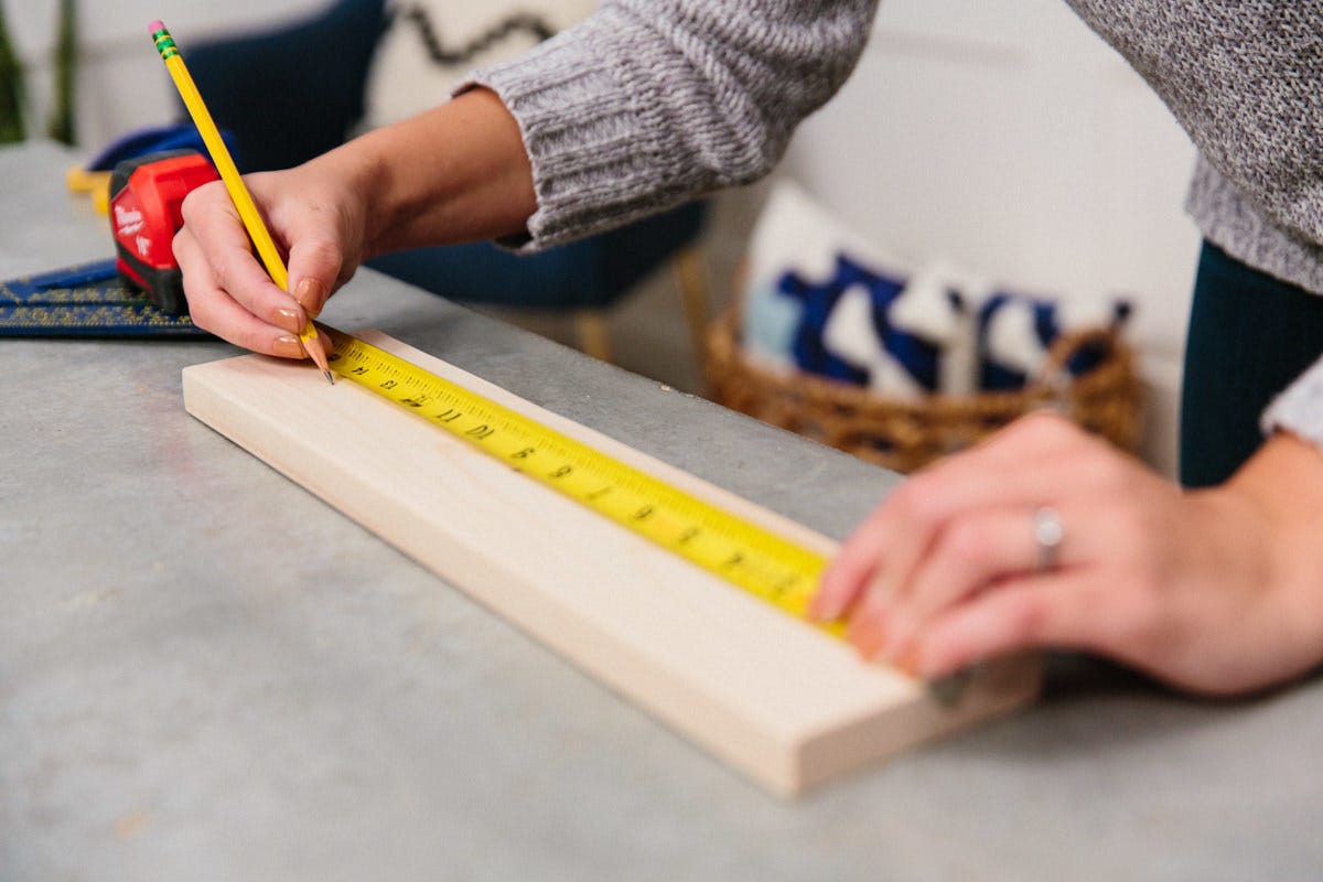 measure and mark holes on wood measure and mark holes on wood