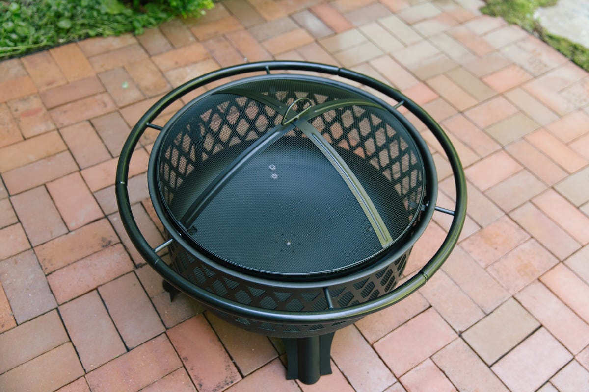 outdoor fire pit Re-assembled, painted outdoor fire pit.