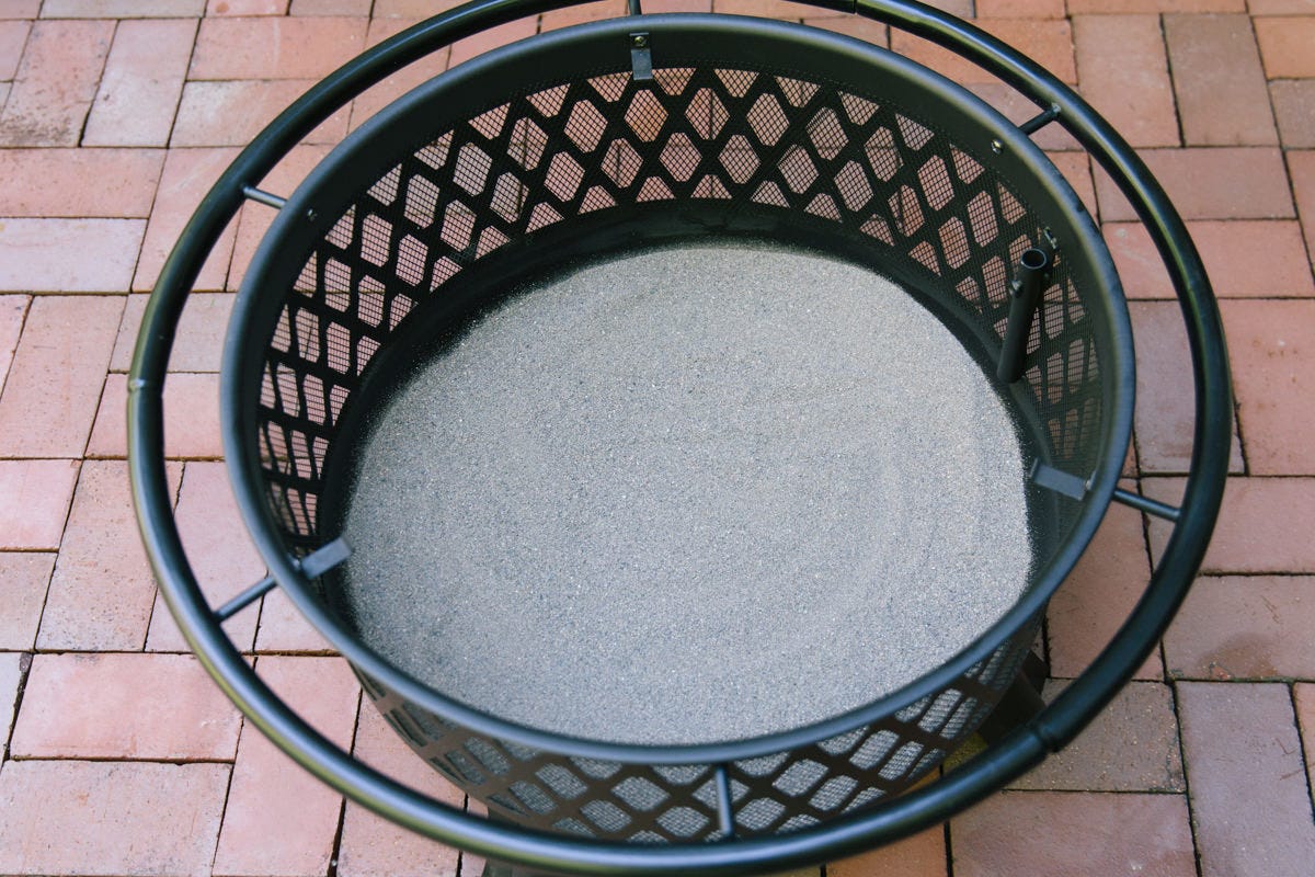 prevent fire rust Fire pit with sand inside.