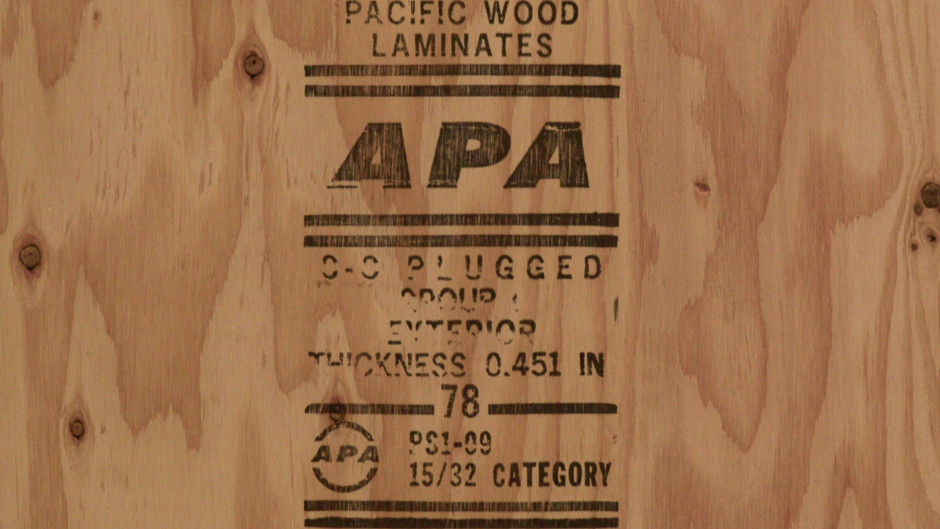 Wood stamped with: "PACIFIC WOOD LAMINATES. APA. 0-0 PLUGGED. GROUP 1. EXTERIOR. THICKNESS 0.451 IN. 78. PS1-09. 15/32 CATEGORY."