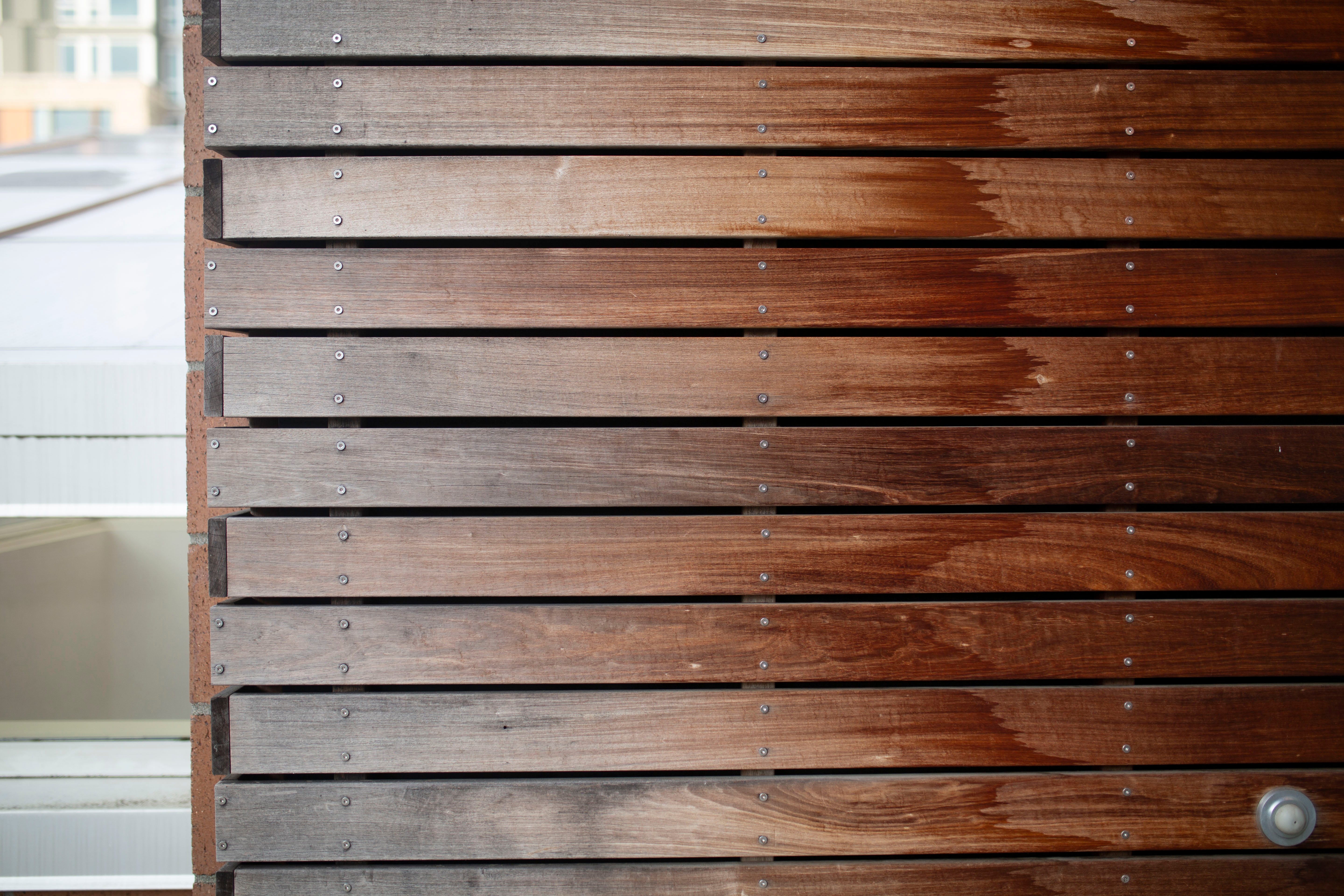Wooden privacy fence made with stainless steel nails.
