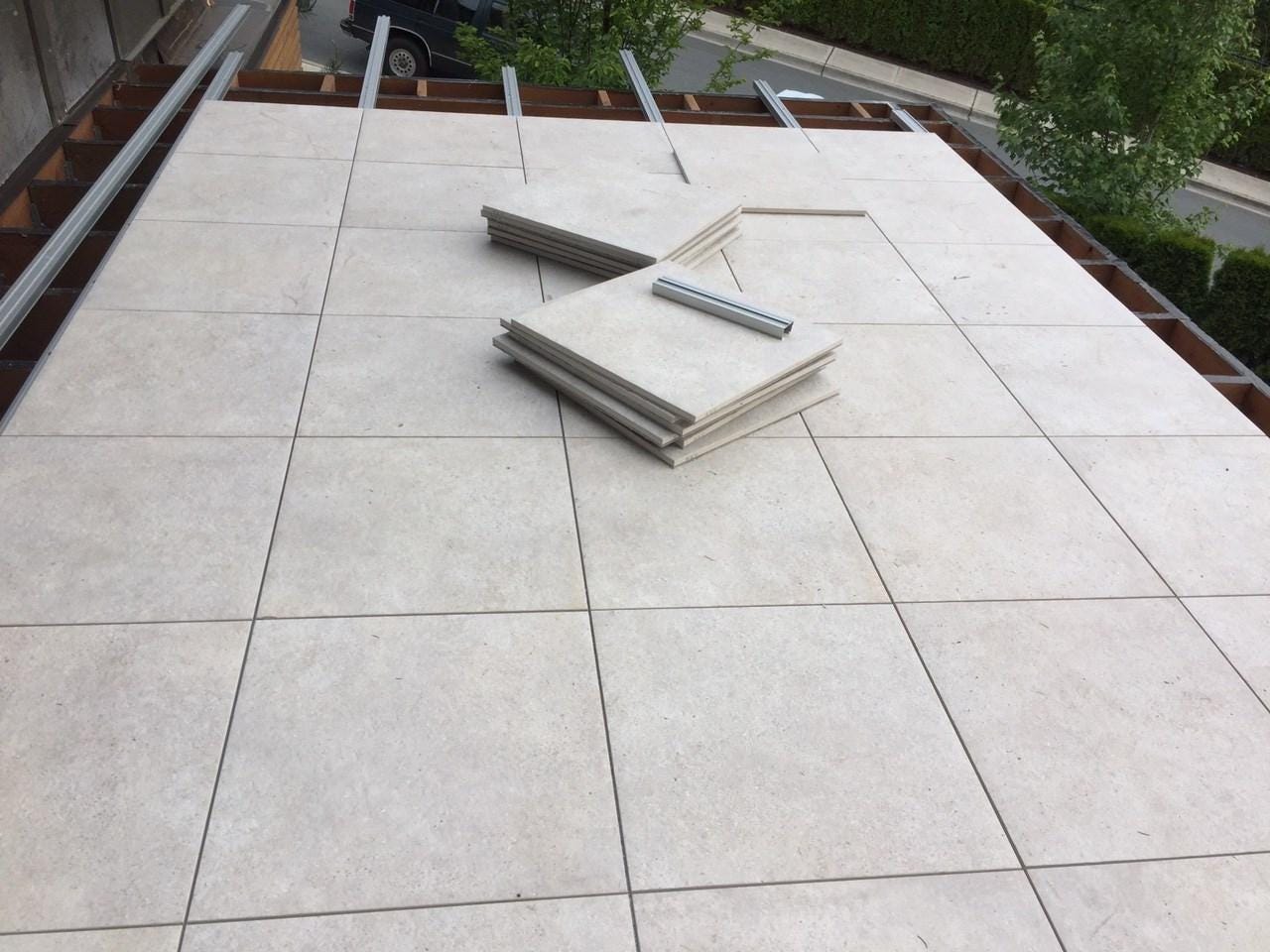 Deck under construction being built with Mbrico tiles.
