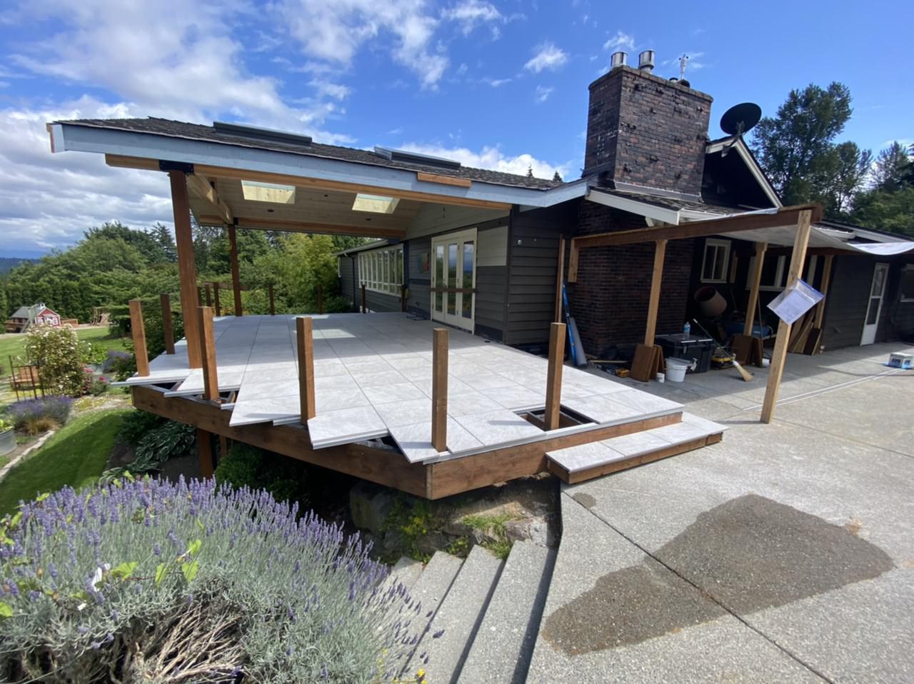 Deck under construction being built with Mbrico tiles.