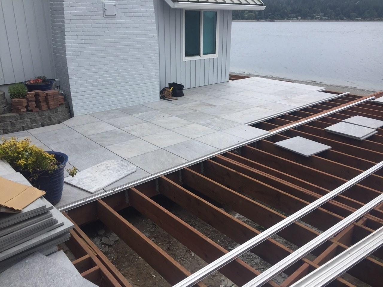 Deck under construction being built with Mbrico tiles.